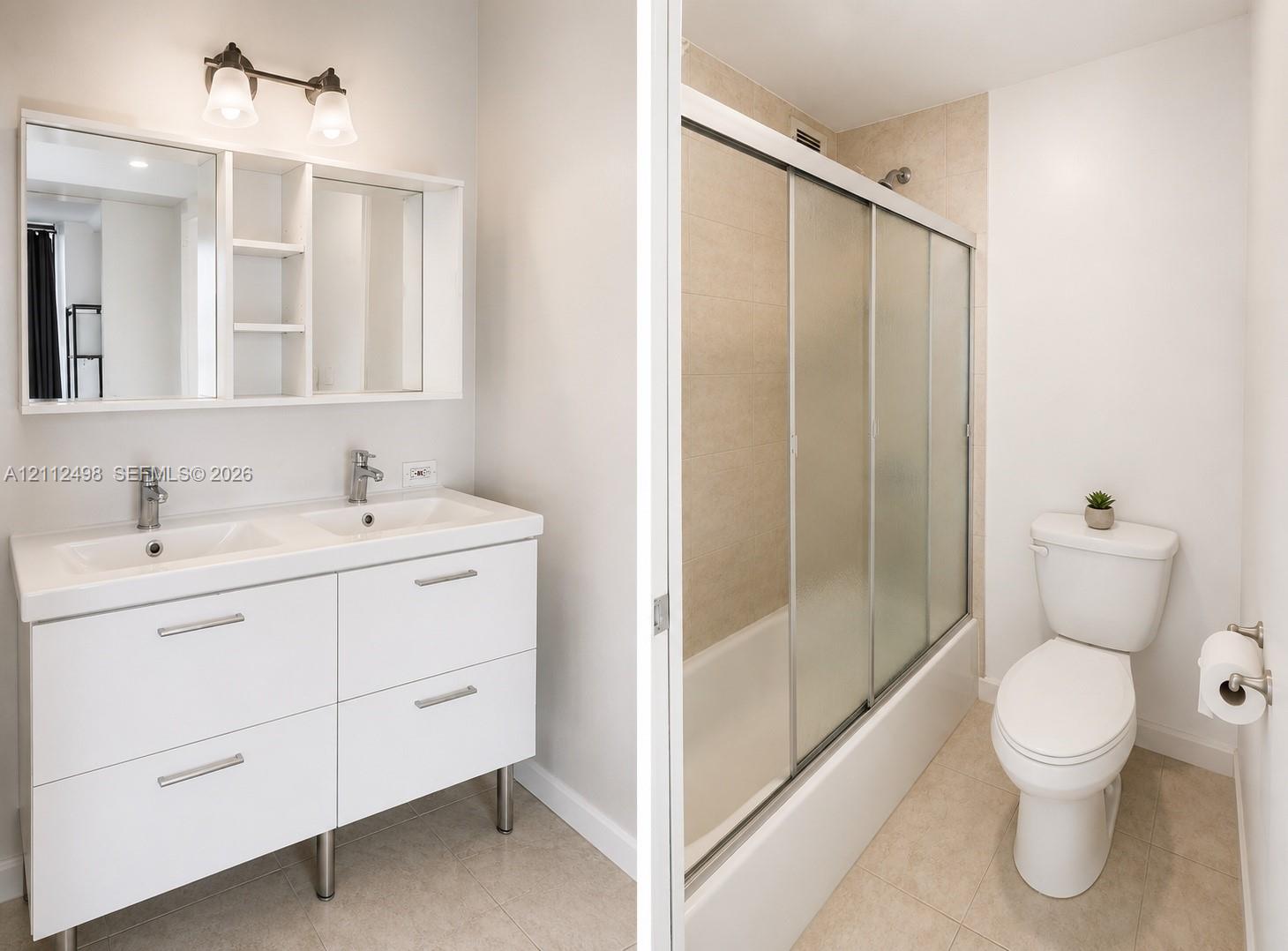Double-sink vanity with white cabinetry and integrated storage, topped with a dual-mirror medicine cabinet