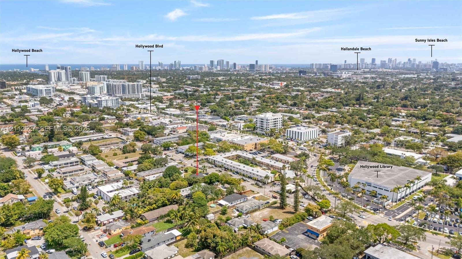 Aerial perspective of the metropolitan region with visibility of the coastline and surrounding urban infrastructure