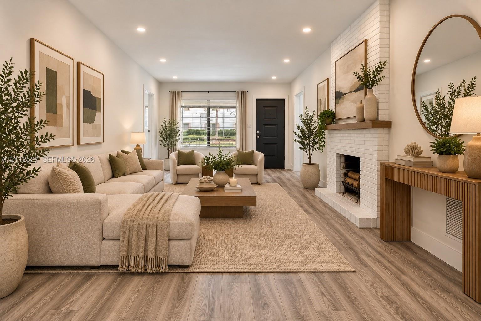 Open-concept living space featuring wood-finish flooring, recessed lighting, and a white-painted brick fireplace with a wood mantel