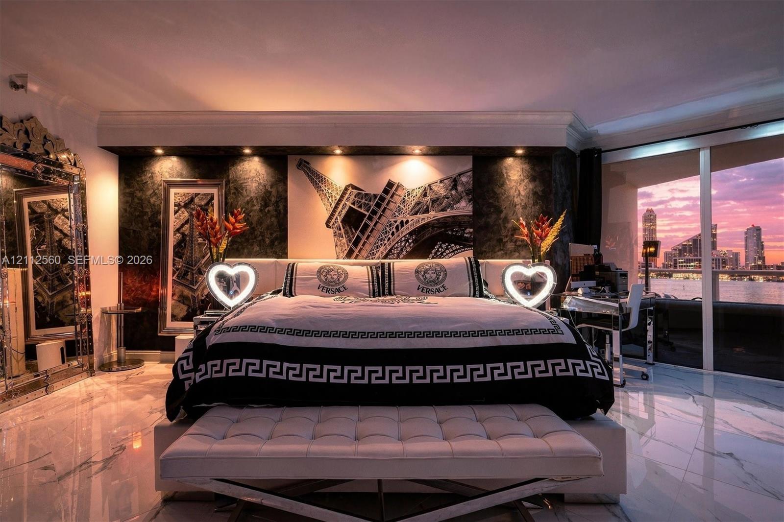 Polished stone flooring, floor-to-ceiling glass wall, and integrated recessed ceiling lighting