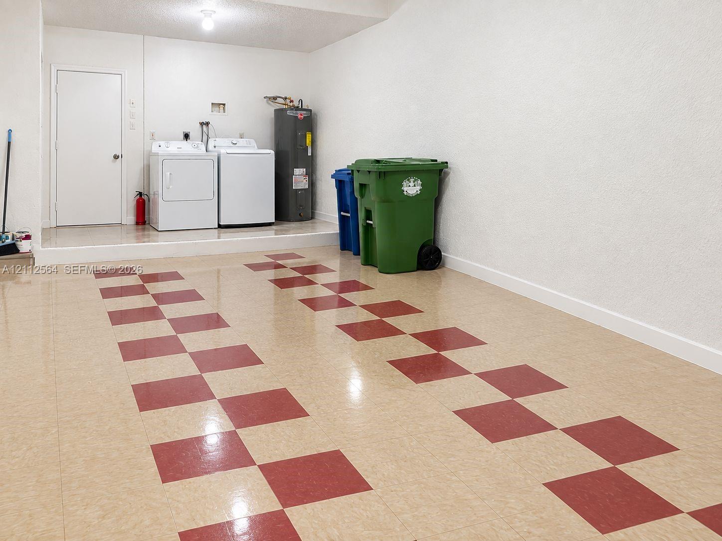 Attached garage with washer and dryer