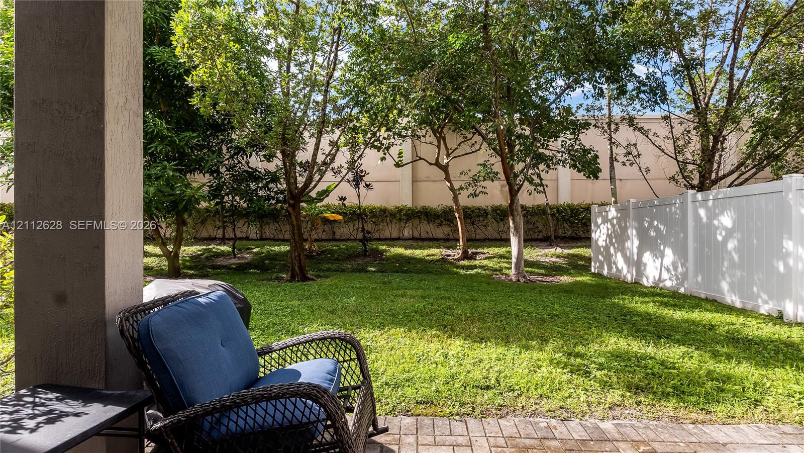 A charming covered patio extending your living space outdoors, ideal for relaxed evenings, weekend grilling, or effortless indooroutdoor entertaining.