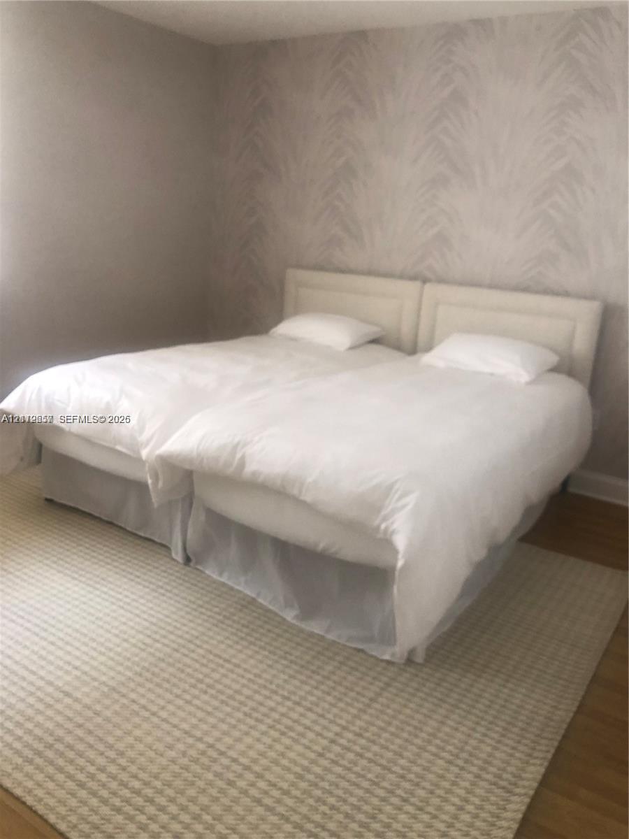 Textured wall covering and wood-finish flooring