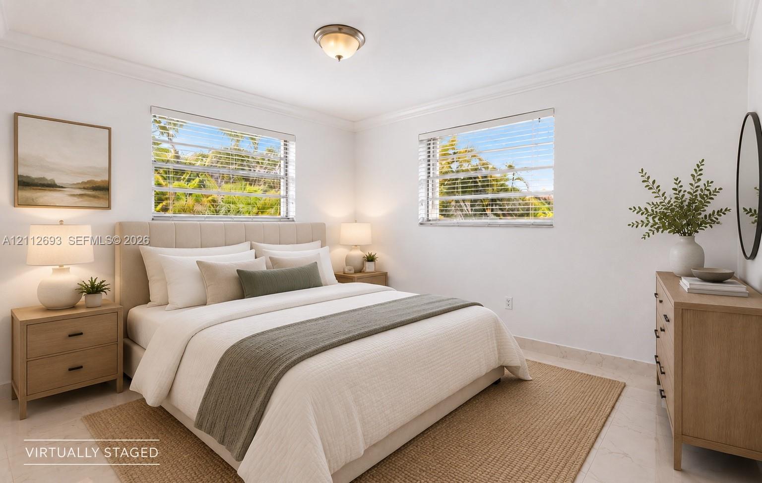 Bedroom featuring neutral-toned floor tile, crown molding, and dual horizontal sliding windows
