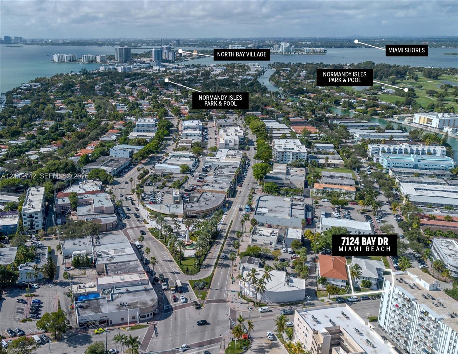Aerial perspective of the property at 7124 Bay Drive featuring proximity to North Bay Village, Miami Shores, and Normandy Isles Park
