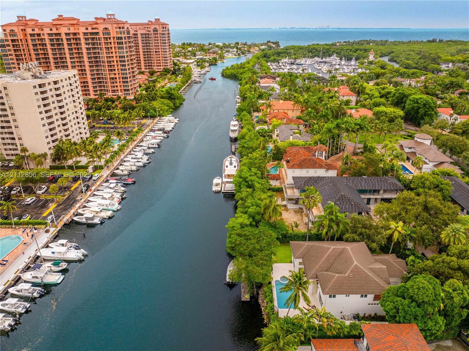 Waterfront property featuring a private swimming pool, deep-water canal access, and proximity/no bridges to open bay waters