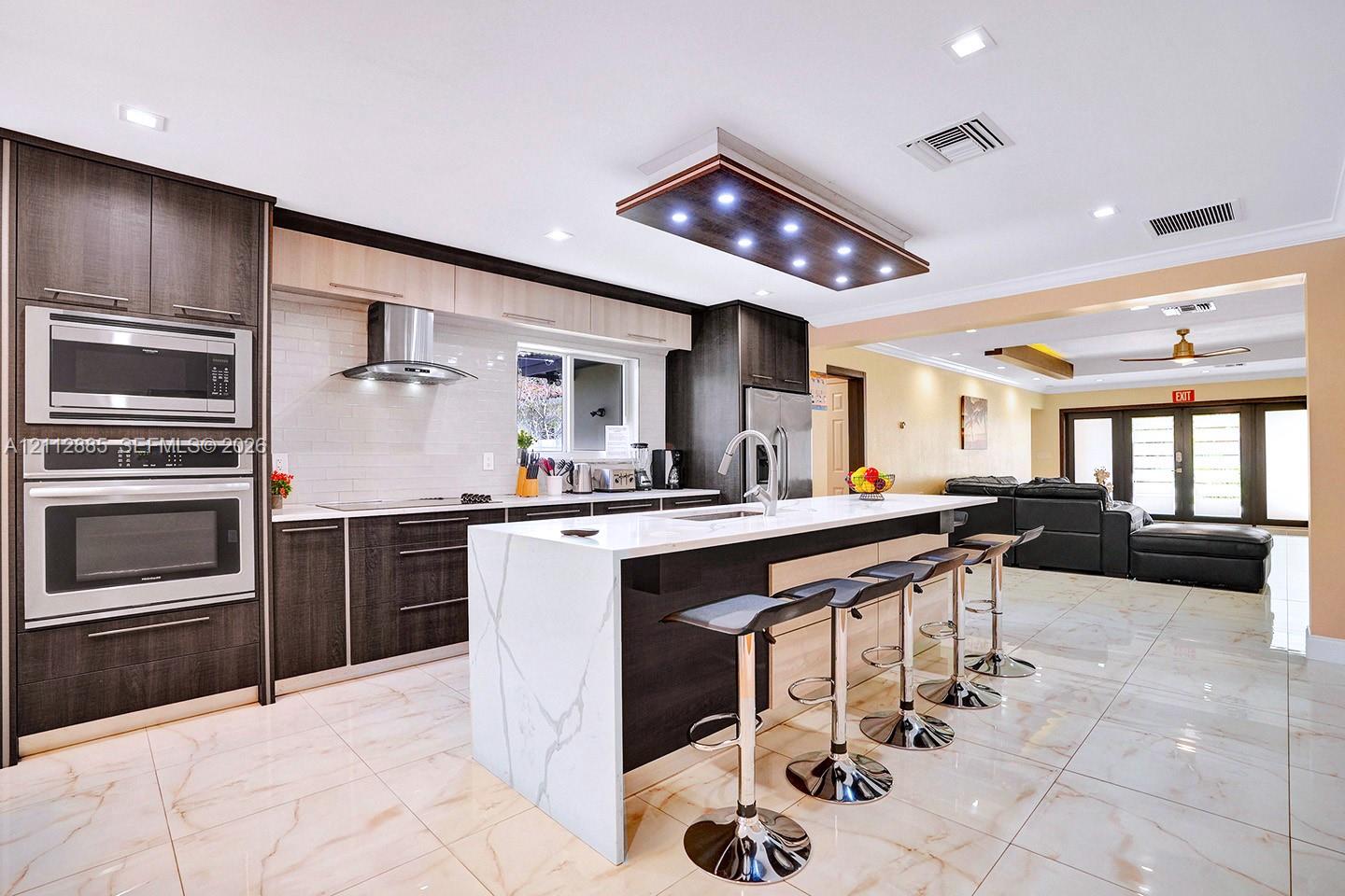 Open Kitchen/w Quartz Kitchen Isle & SS Appliences
