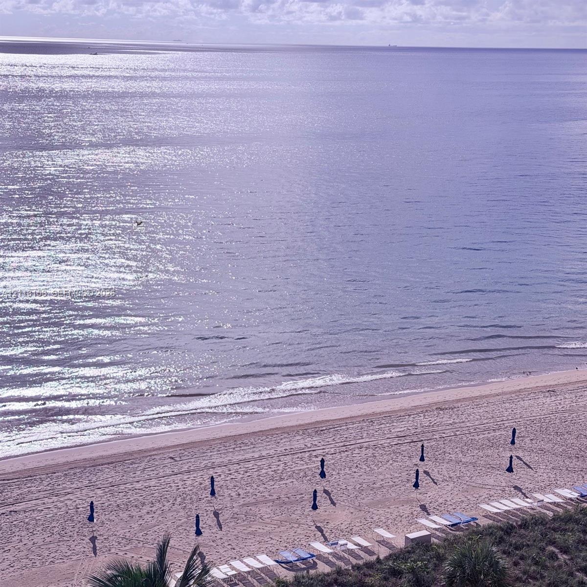 Direct oceanfront exposure featuring expansive sandy beach access