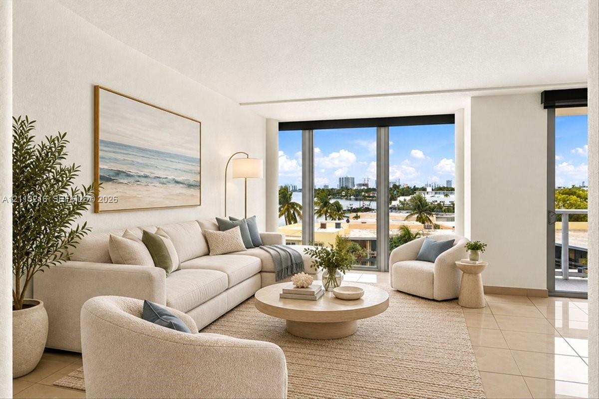 Living area featuring floor-to-ceiling windows, tile flooring, and access to a private balcony Living area featuring floor-to-ceiling windows, tile flooring, and access to a private balcony