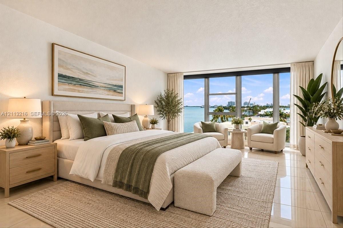 Floor-to-ceiling windows featuring expansive coastal scenery, neutral tile flooring, and a sleek, minimalist aesthetic