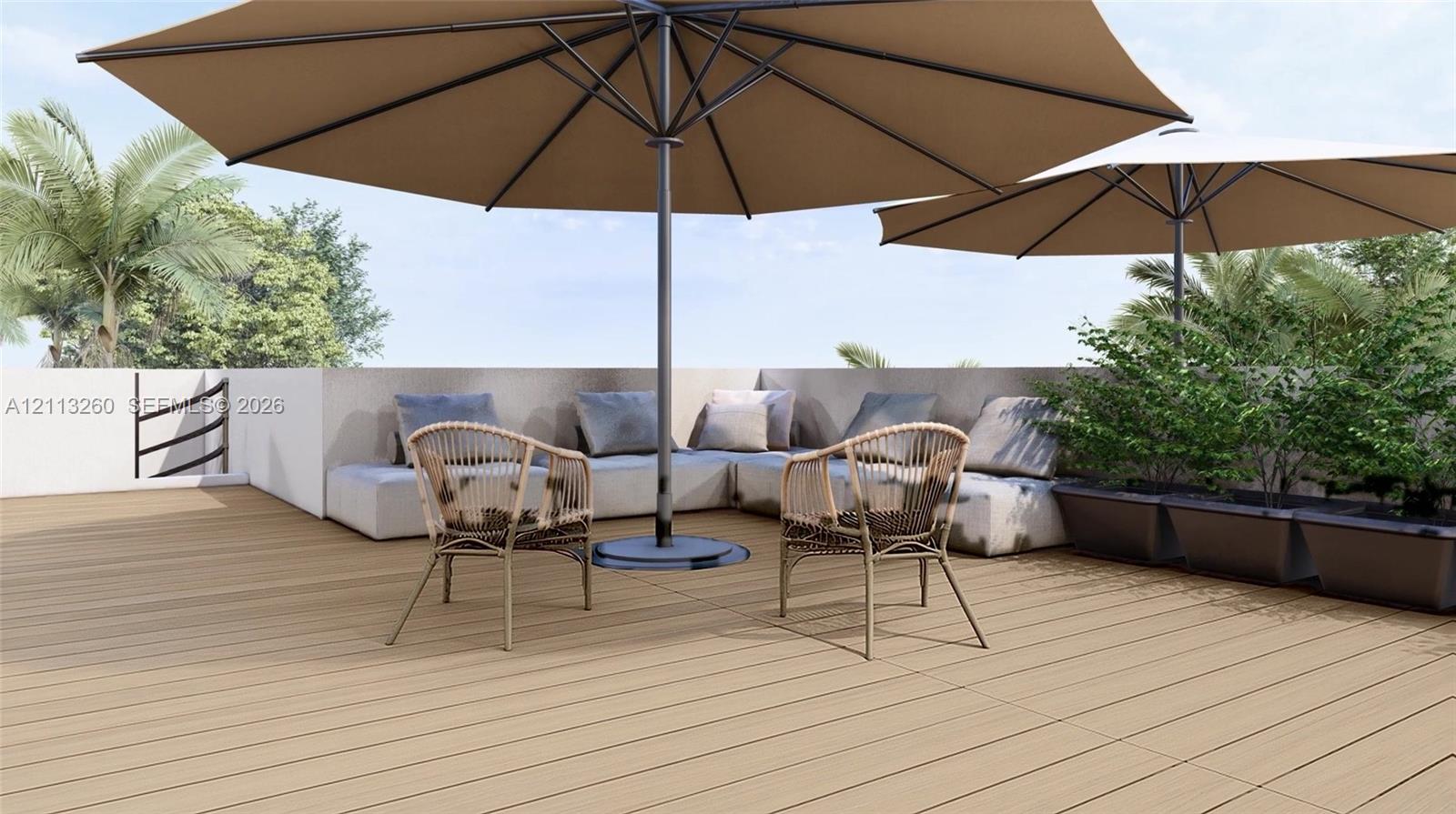 Rooftop terrace featuring composite decking, solid masonry perimeter walls, and built-in planters