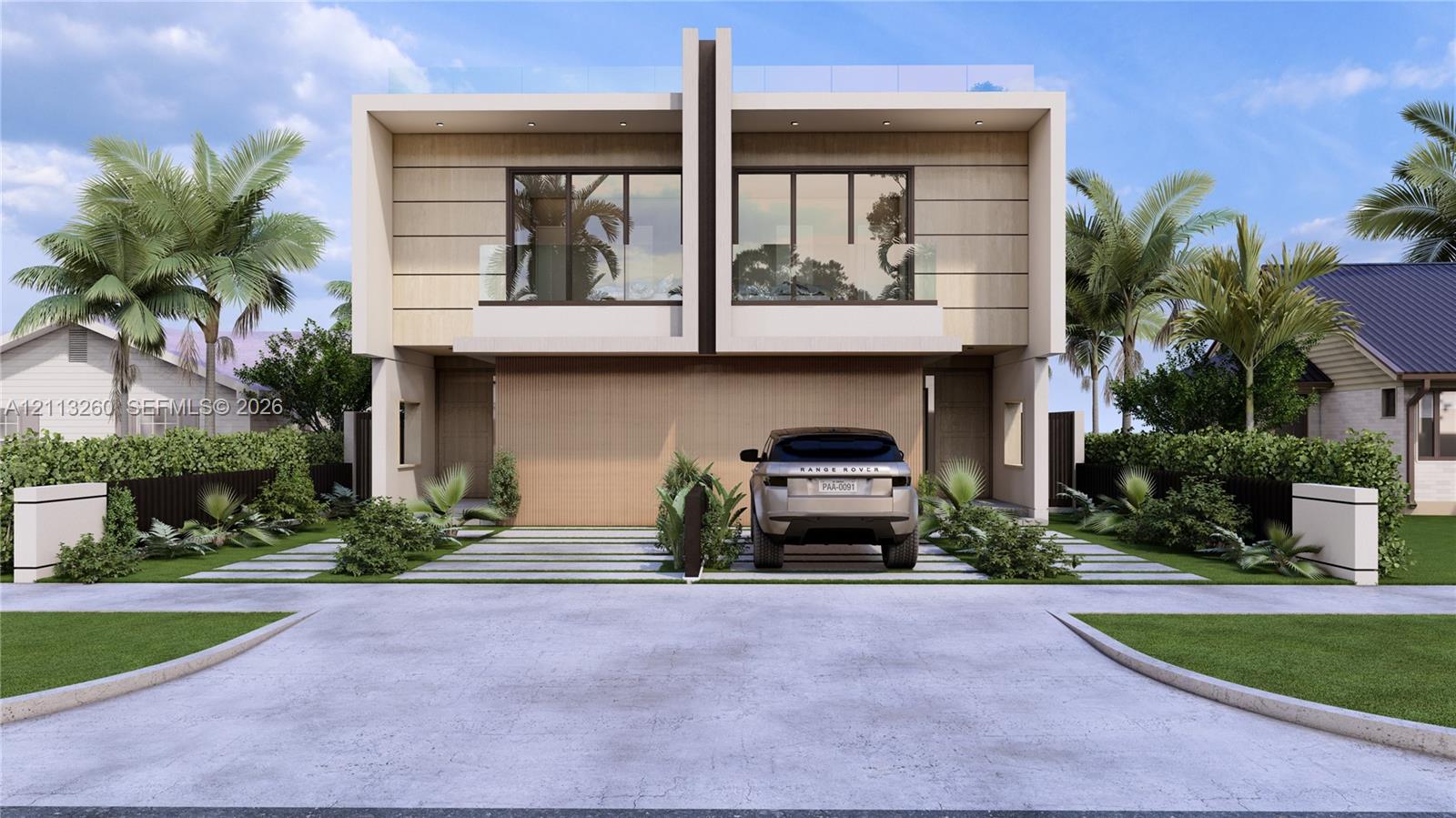 Modern two-story architectural exterior featuring horizontal cladding, glass-panel balcony railings, floor-to-ceiling windows, and integrated concrete paver driveway