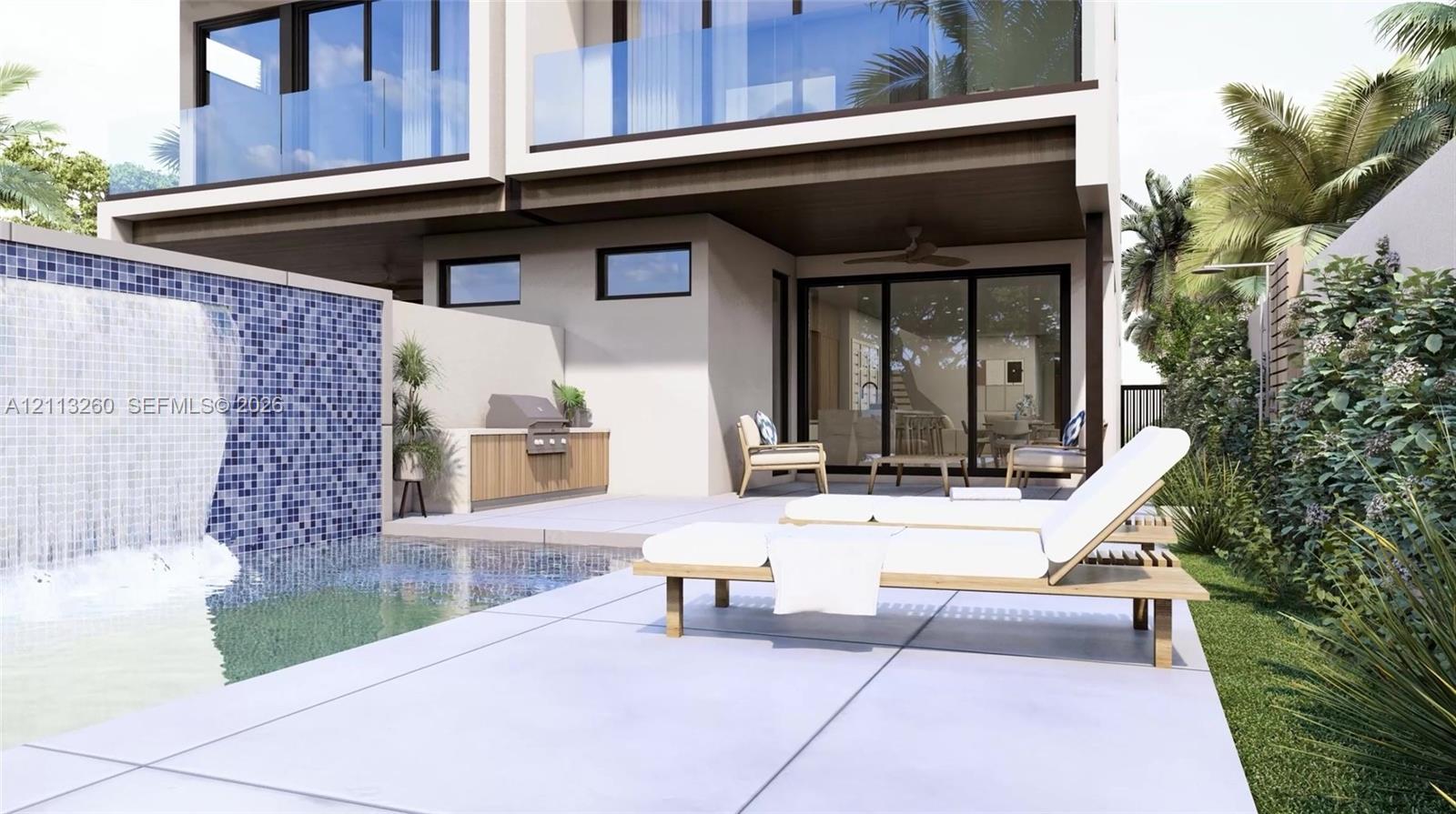 Outdoor living area featuring a swimming pool with a mosaic tile water feature, built-in outdoor kitchen, concrete patio, glass-panel railings, and sliding glass doors