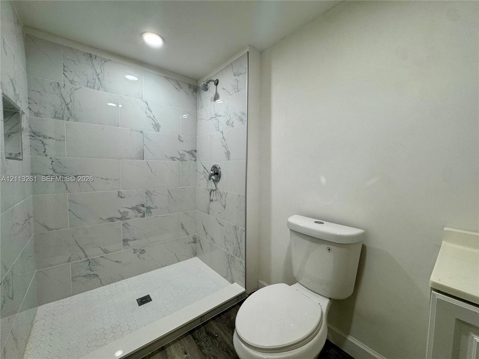 Bathroom of Bonus bedroom in the upstairs section of garage.