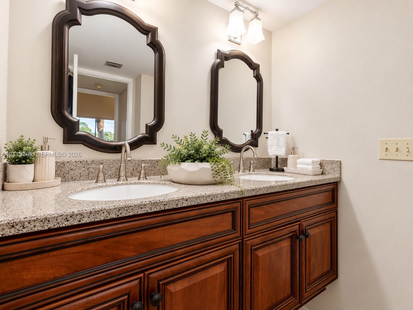 Primary Bathroom Dual-vanity cabinet stone countertop