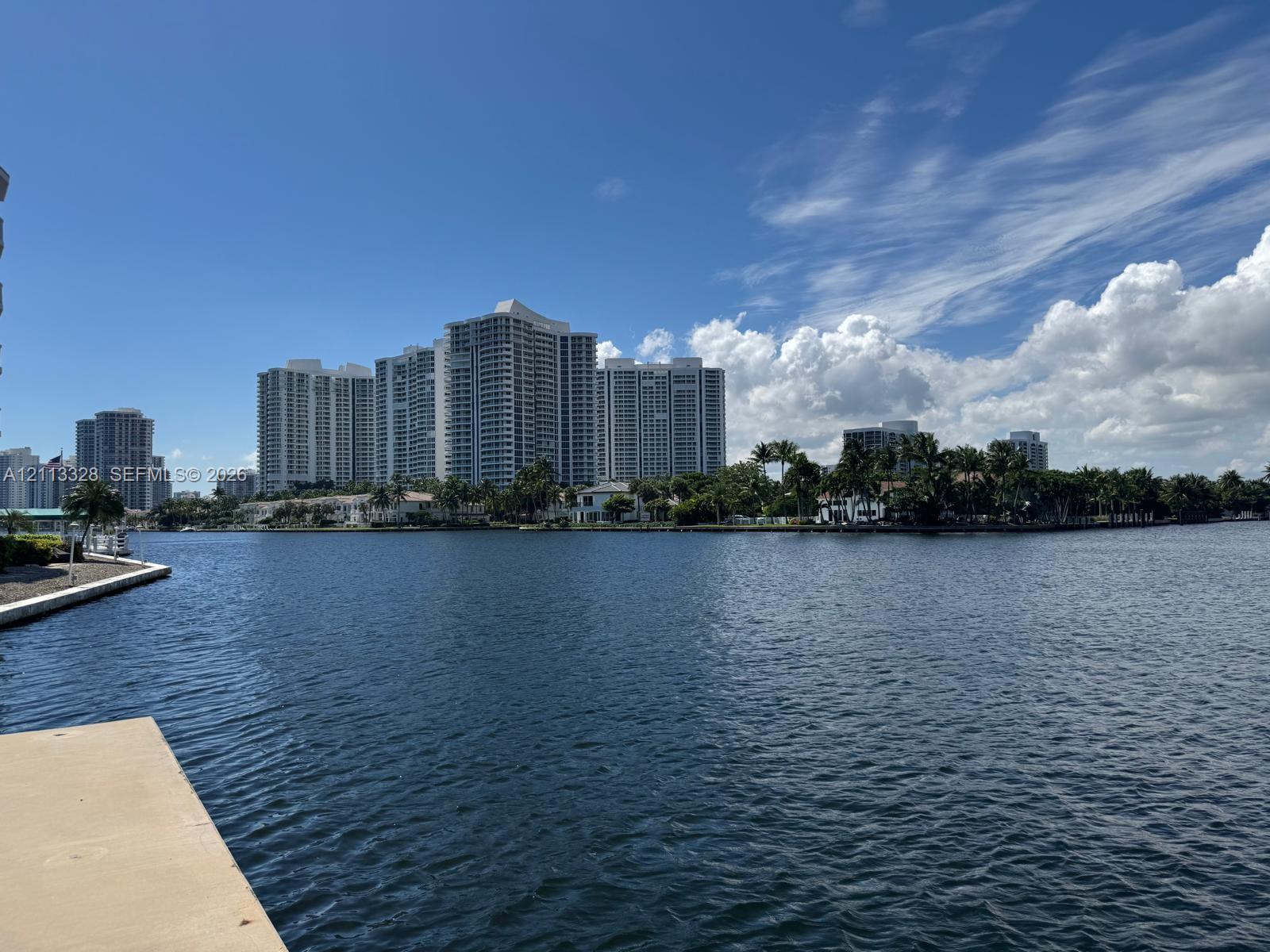Waterfront property featuring a concrete seawall and bulkhead