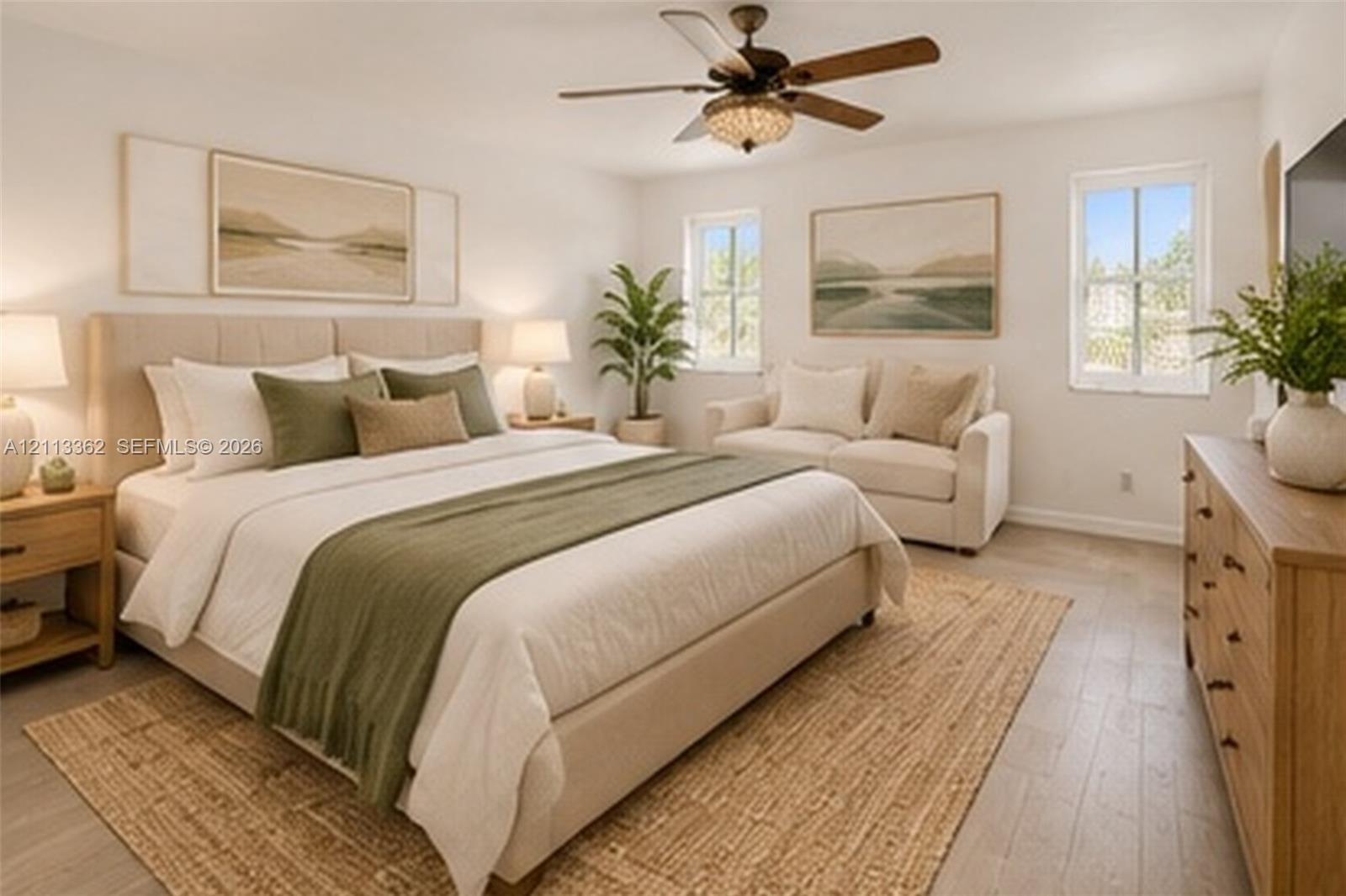 Wood-finish flooring, central ceiling fan with integrated lighting, and dual windows