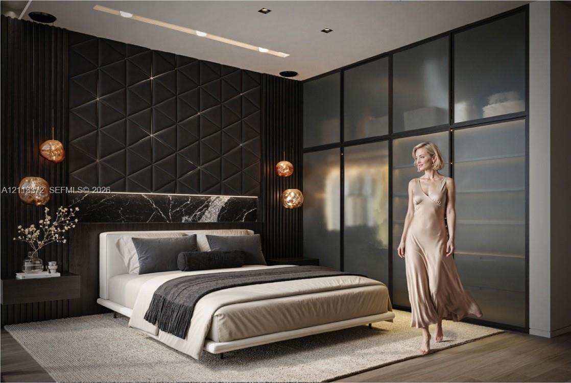 Textured dark accent wall with geometric paneling, integrated stone backsplash, built-in floor-to-ceiling frosted glass wardrobe cabinetry, and recessed ceiling lighting