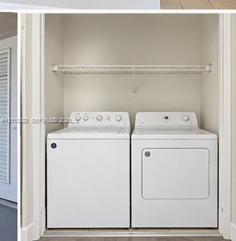 Laundry closet featuring white top-load washer and dryer with wire shelving
