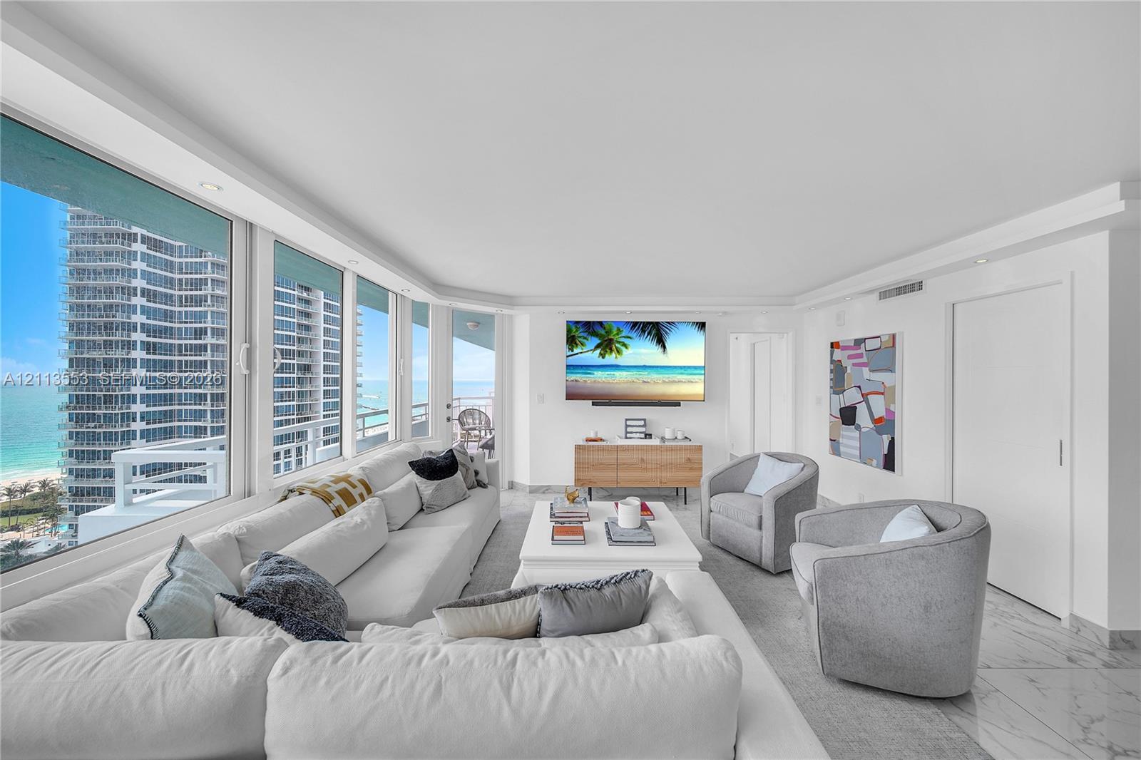 Floor-to-ceiling windows, stone-finish flooring, recessed ceiling lighting, and built-in door hardware Floor-to-ceiling windows, stone-finish flooring, recessed ceiling lighting, and built-in door hardware