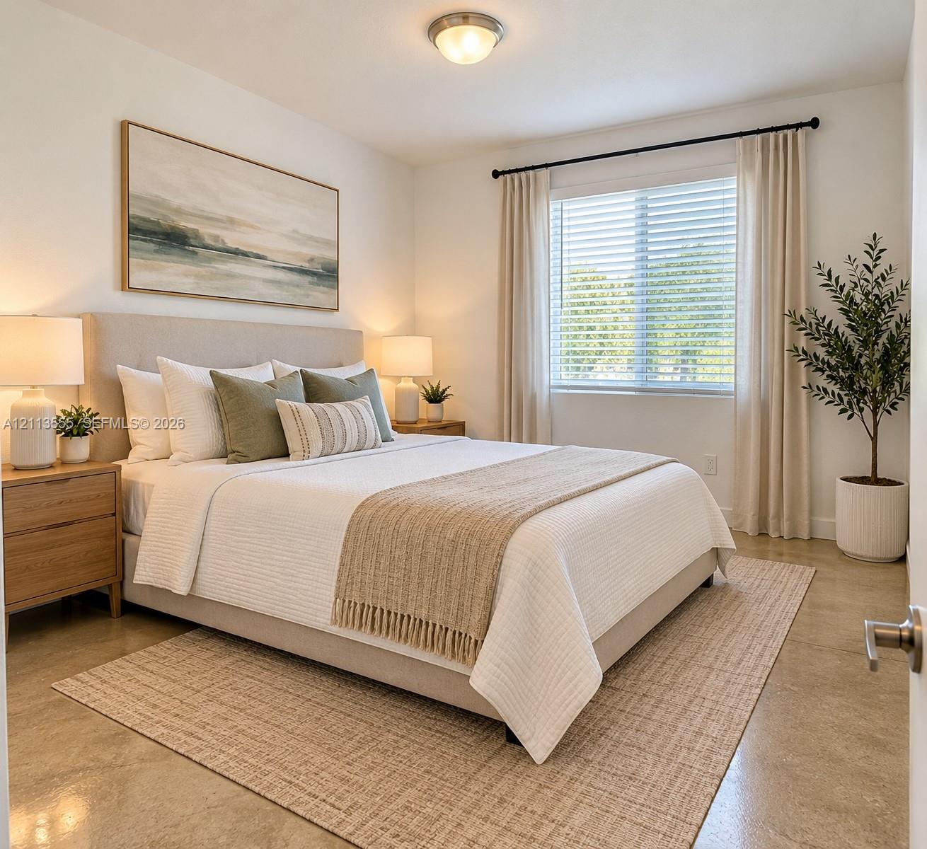 Polished concrete flooring, large window with horizontal blinds, and flush-mount overhead lighting