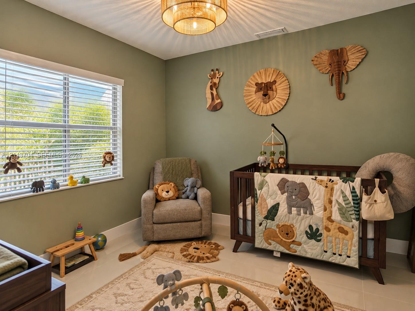 Neutral-toned room featuring a tiered drum-style ceiling light fixture, oversized window with horizontal blinds, and tile flooring Neutral-toned room featuring a tiered drum-style ceiling light fixture, oversized window with horizontal blinds, and tile flooring