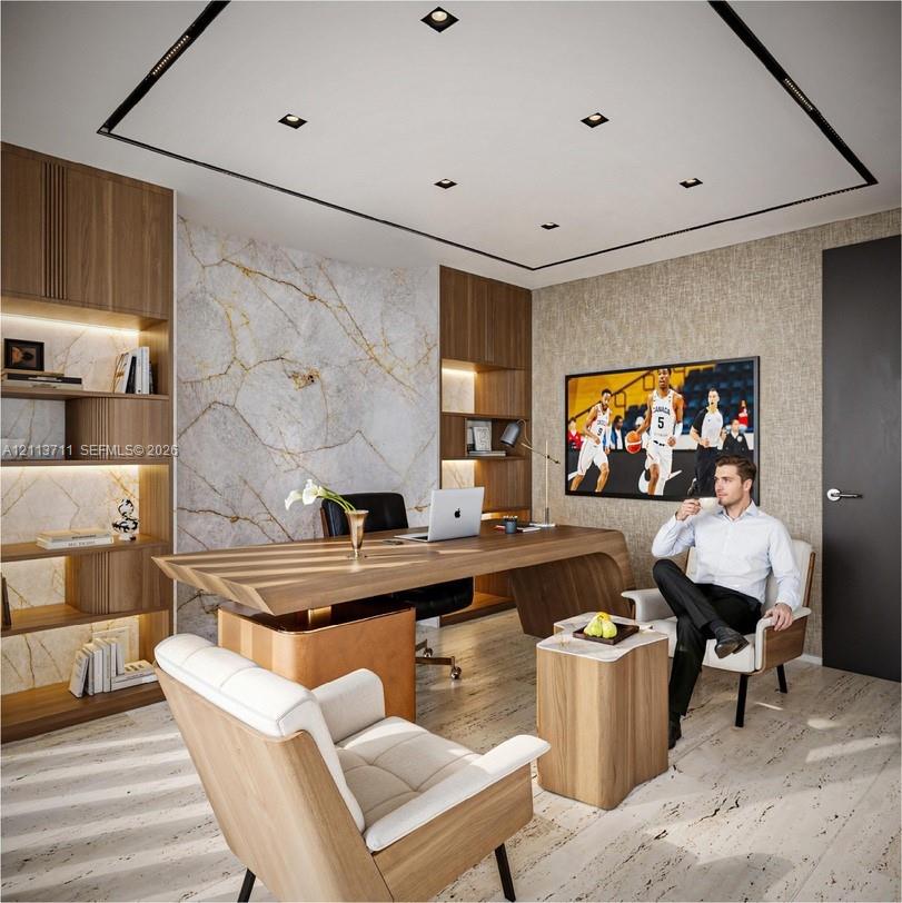 Custom floor-to-ceiling wood cabinetry with integrated shelving, stone-finish accent wall with gold veining, recessed tray ceiling lighting, and polished stone flooring