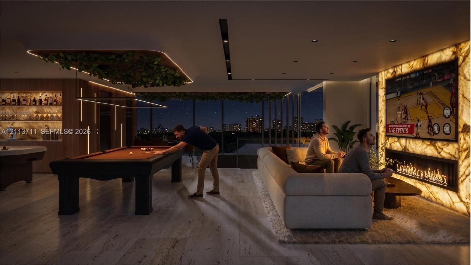 Illuminated stone accent wall featuring a built-in linear fireplace, recessed ceiling lighting, wood-finish flooring, and integrated wet bar with stone-surround shelving