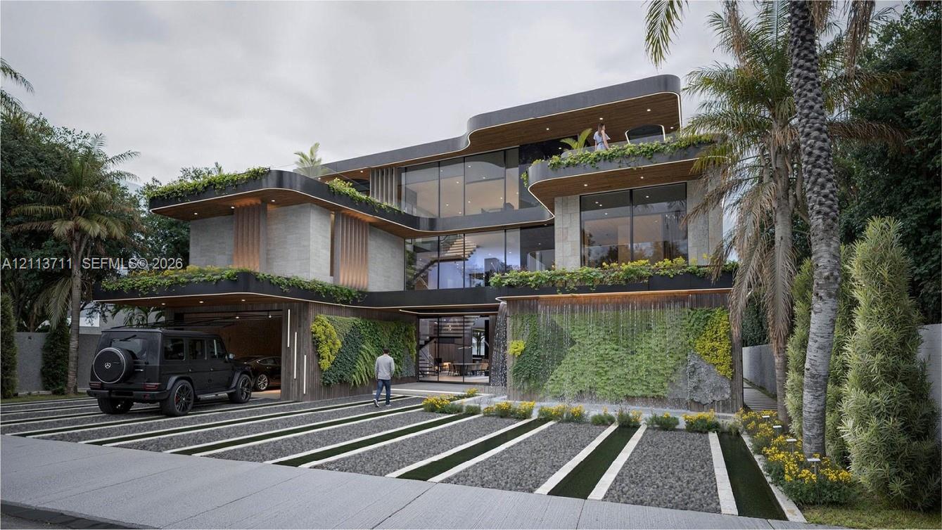 Contemporary three-story residence featuring expansive floor-to-ceiling glass paneling, integrated vertical garden walls, multi-level cantilevered balconies, and a built-in cascading water feature