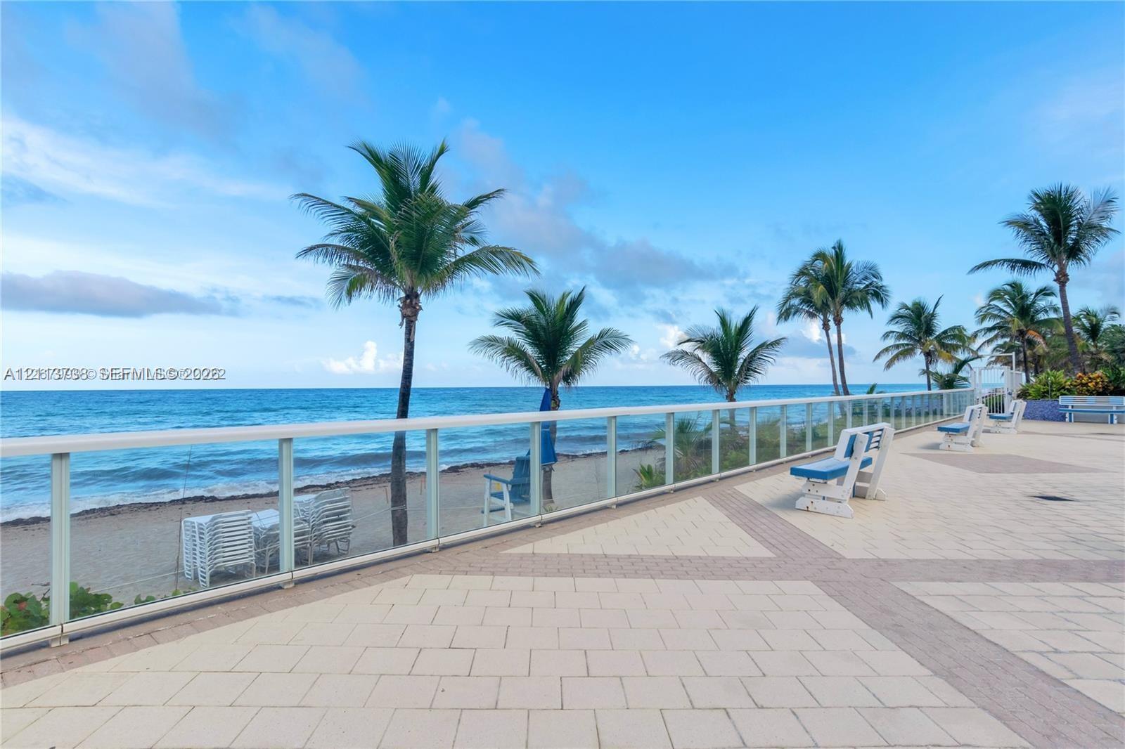 Pool Deck w Glass Railing to View the Beach