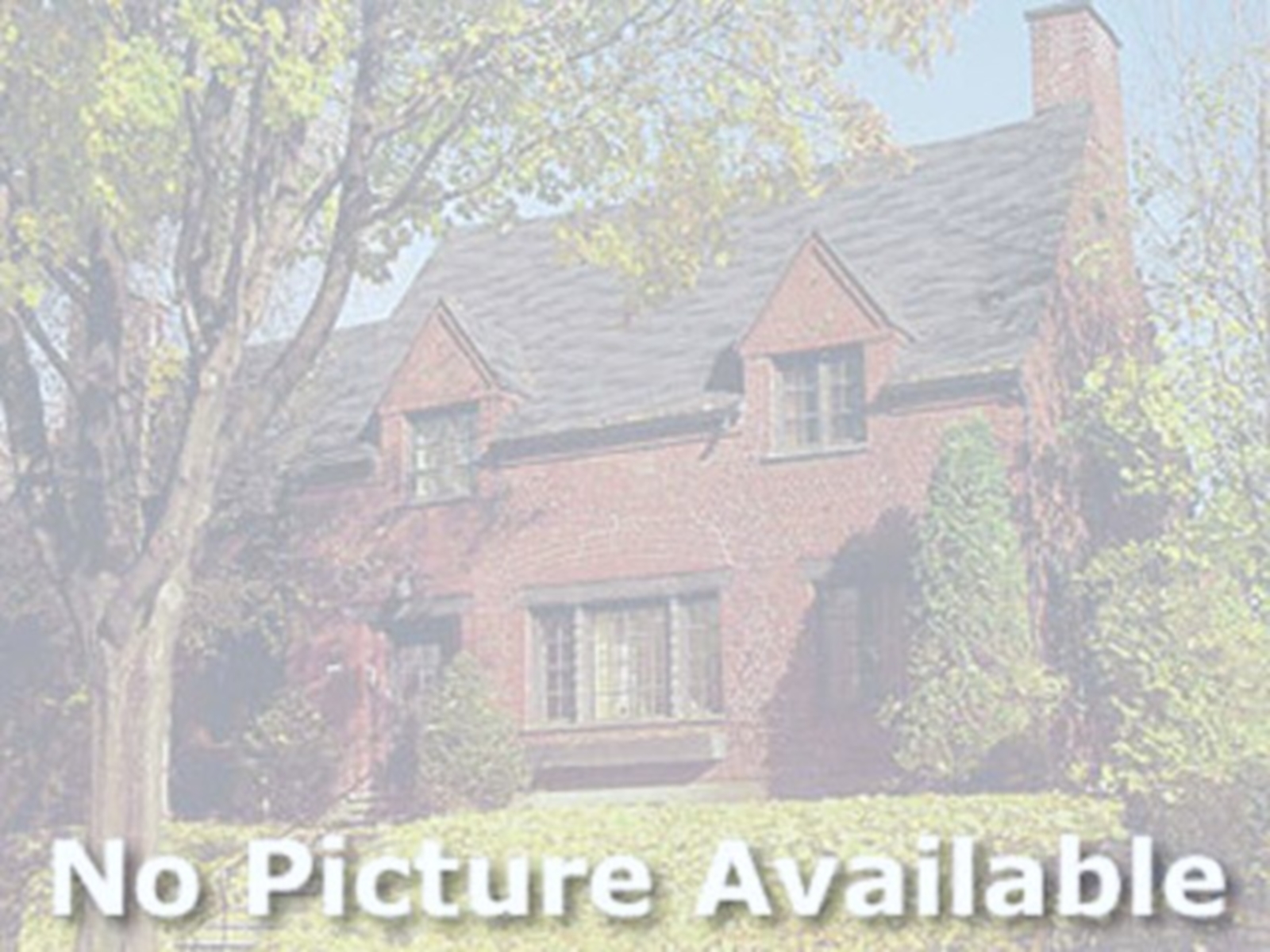 Textured wall coverings, wood-finish flooring, crown molding, tiered chandelier, and multi-light pendant fixture