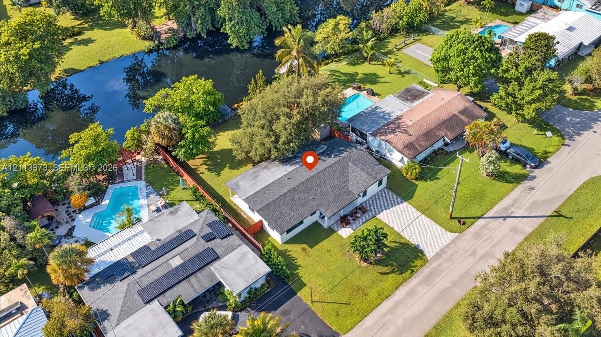 Freedom in your land. driveway, expansive lawn, and direct waterfront access