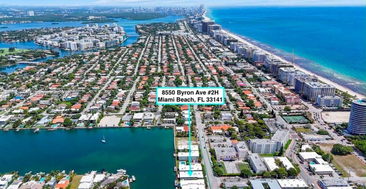 Aerial perspective of Miami Beach coastal neighborhood featuring proximity to the Atlantic Ocean, waterway access, and urban infrastructure