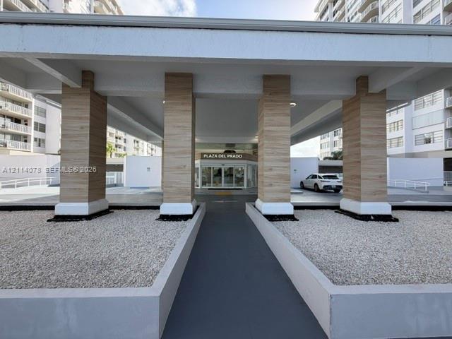 entrance way with security and video screen