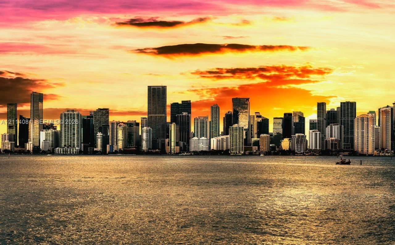 Panoramic urban skyline featuring high-rise architecture and expansive waterfront exposure