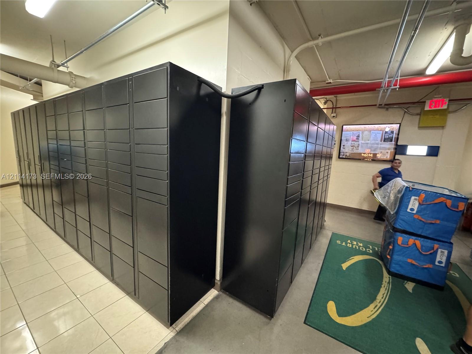 Automated parcel locker system with modular storage compartments and tile flooring
