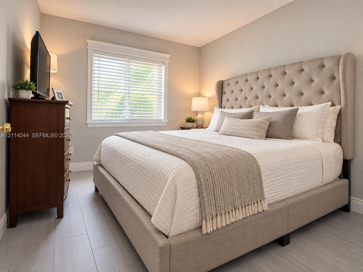 2nd bedroom with golf course garden view.
