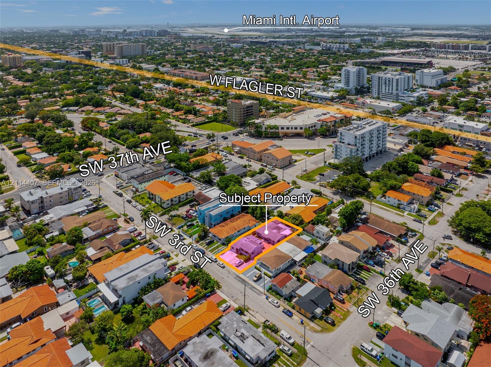 Aerial perspective of the subject property situated at the intersection of SW 3rd St and SW 36th Ave, featuring proximity to W Flagler St and established urban infrastructure