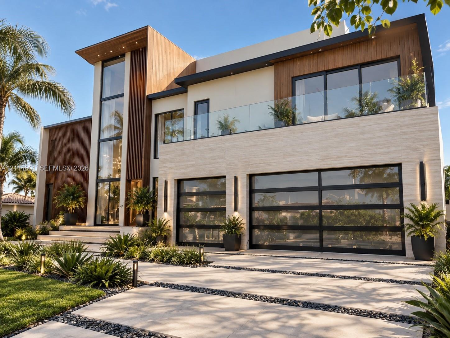 Modern architectural exterior featuring wood-tone accents, floor-to-ceiling glass windows, a glass-railed second-story balcony, horizontal-panel garage doors, and stone-clad facade