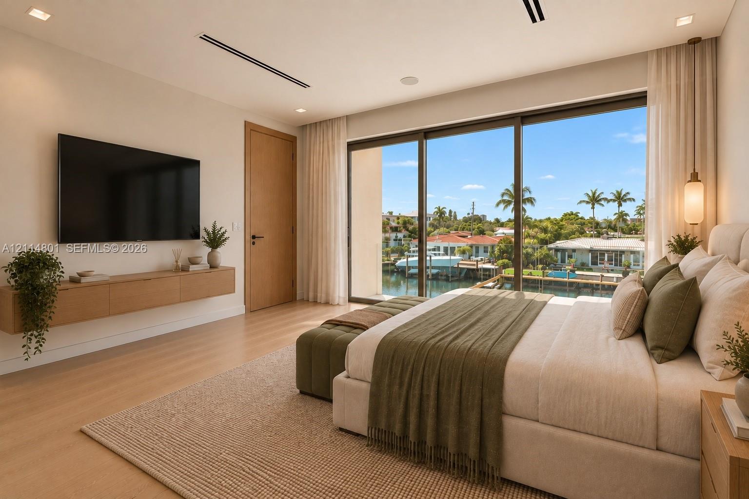 Floor-to-ceiling sliding glass doors, built-in wall-mounted cabinetry, wood-finish flooring, recessed lighting, and integrated ceiling speakers