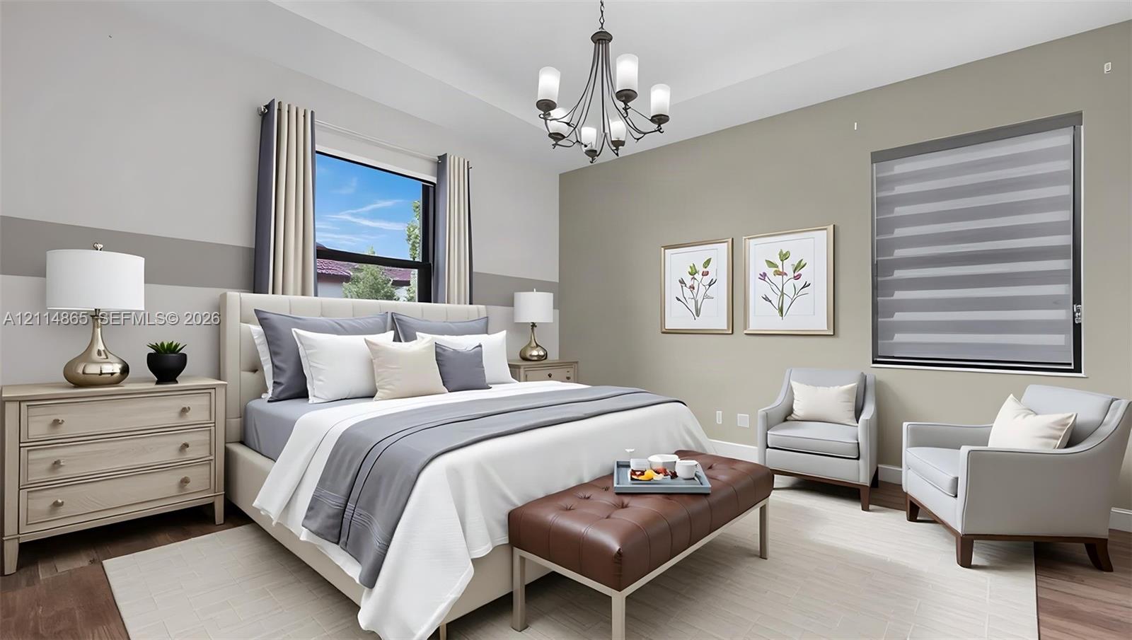 Virtually staged, Tray ceiling, multi-arm chandelier, dual-tone wall paint, and wood-finish flooring