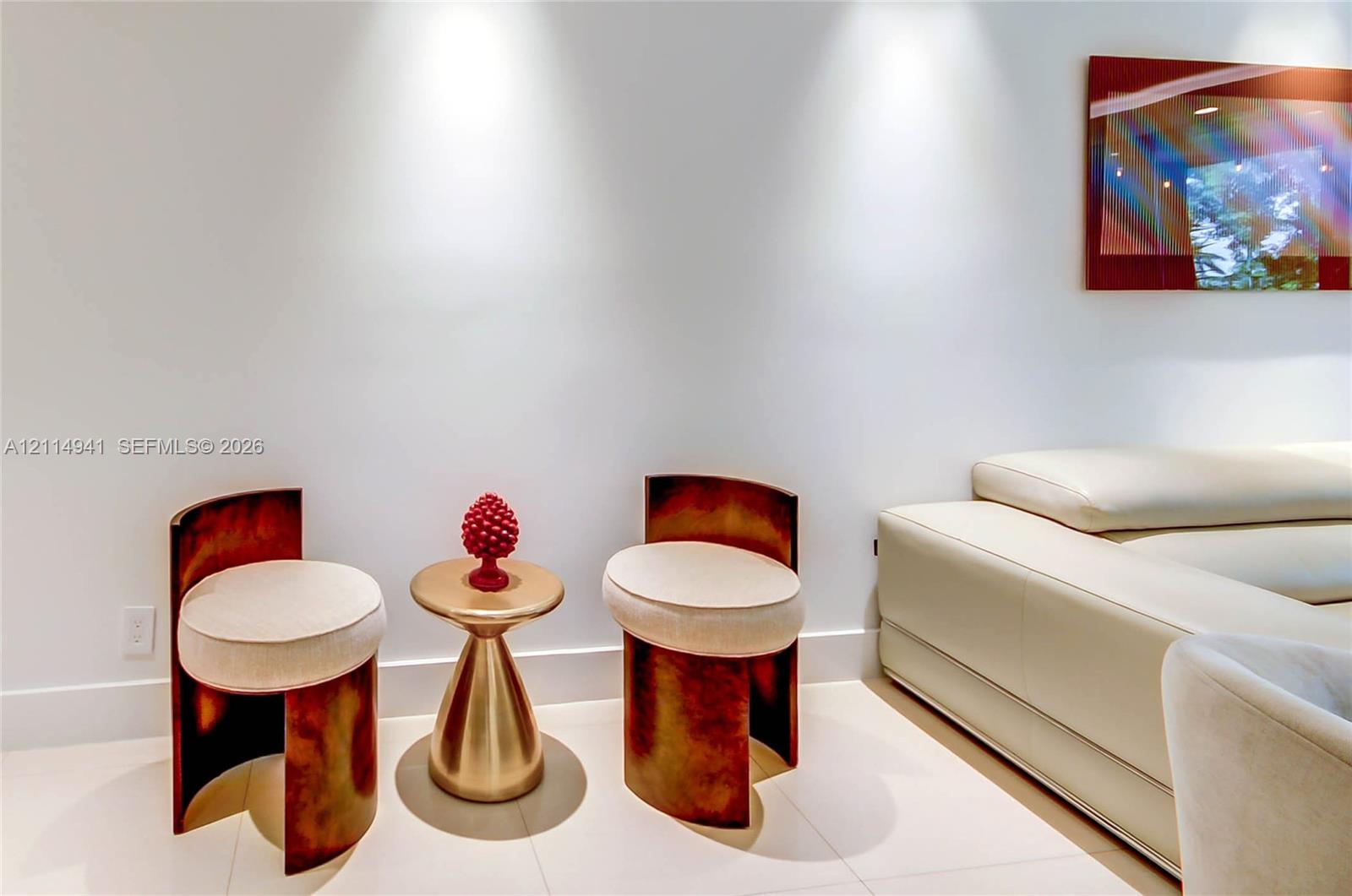 Smooth, large-format tile flooring paired with recessed ceiling lighting Smooth, large-format tile flooring paired with recessed ceiling lighting