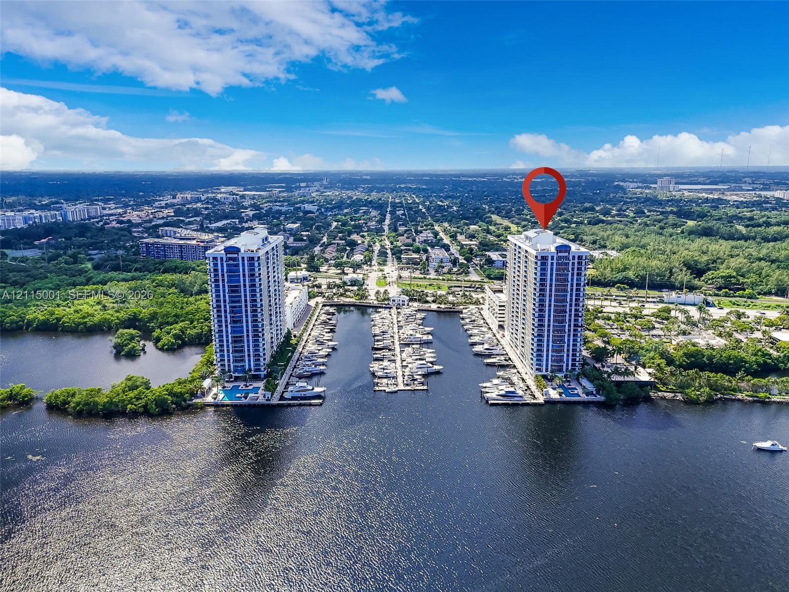 High-rise residential tower featuring direct water frontage, a private deep-water marina, and ground-level outdoor swimming pools High-rise residential tower featuring direct water frontage, a private deep-water marina, and ground-level outdoor swimming pools
