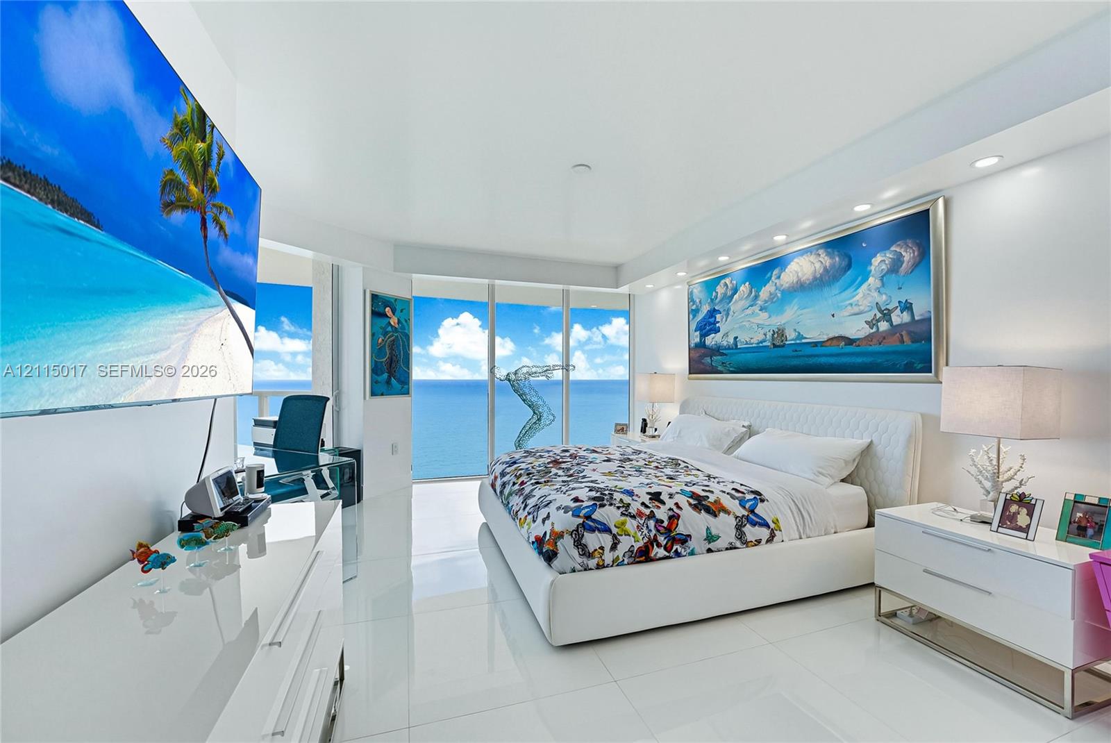 Floor-to-ceiling glass windows, polished tile flooring, and recessed ceiling lighting