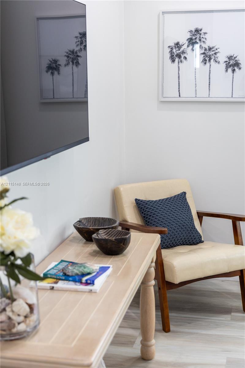 Light-toned wood-finish flooring with a neutral interior wall palette
