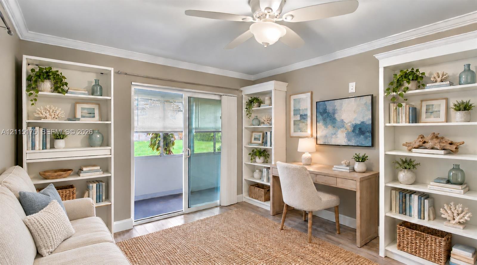 Second bedroom virtually staged as an office/den