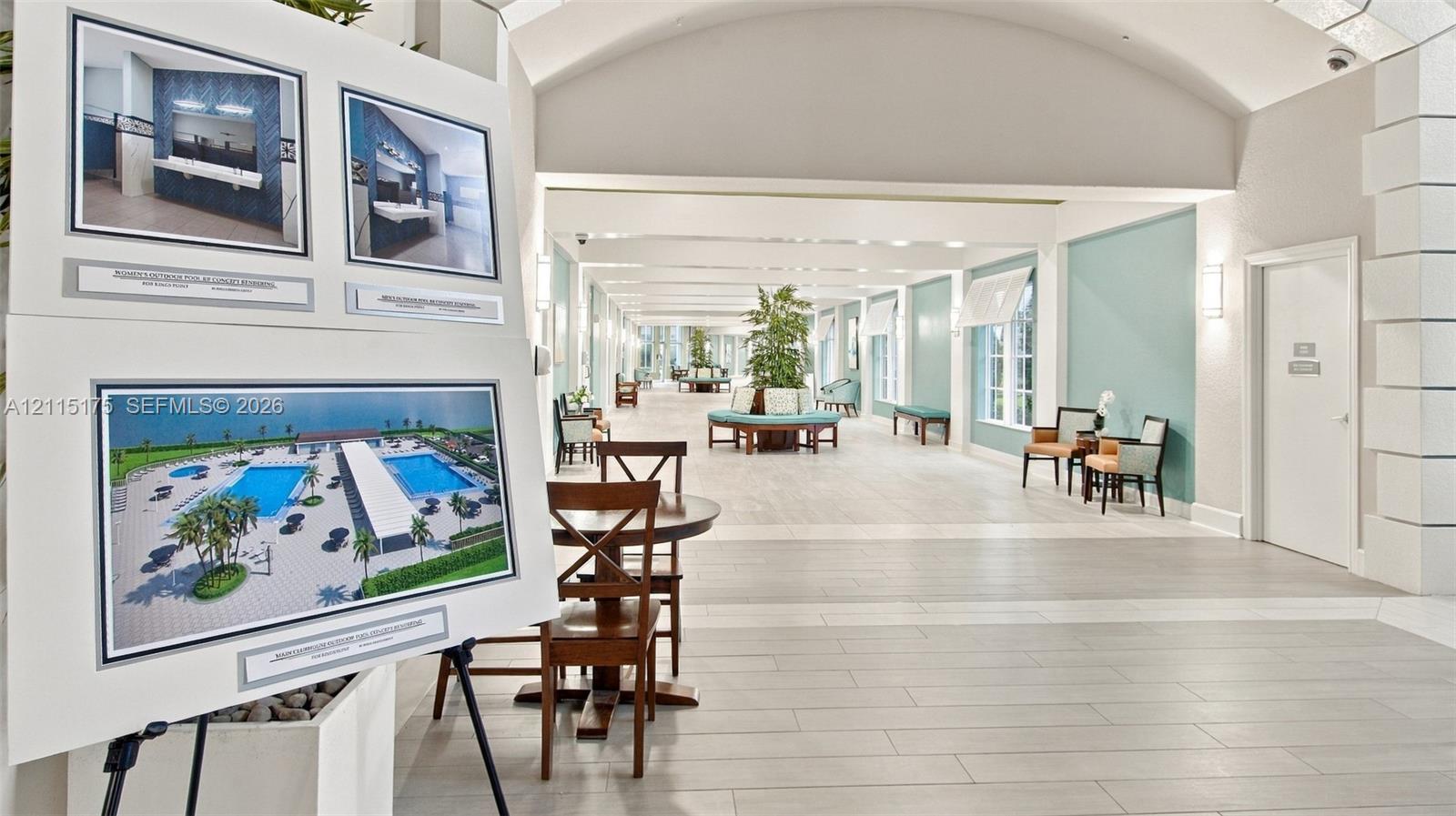 Main clubhouse with photo of projected renovations to outdoor pools