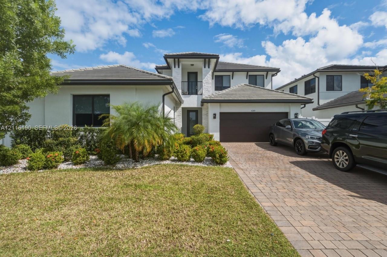 Front entrance and garage.