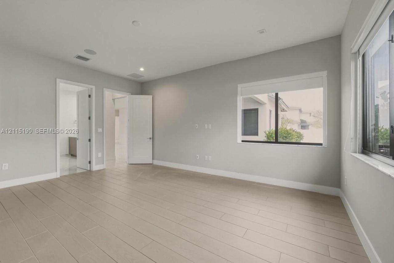 Bedroom with adjoining bathroom.