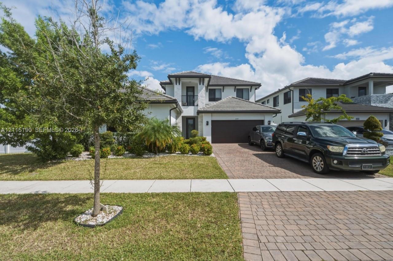 Front exterior and driveway.